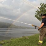 Firefighters train, families take a turn on the hose