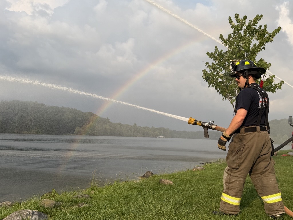 Firefighters train, families take a turn on the hose